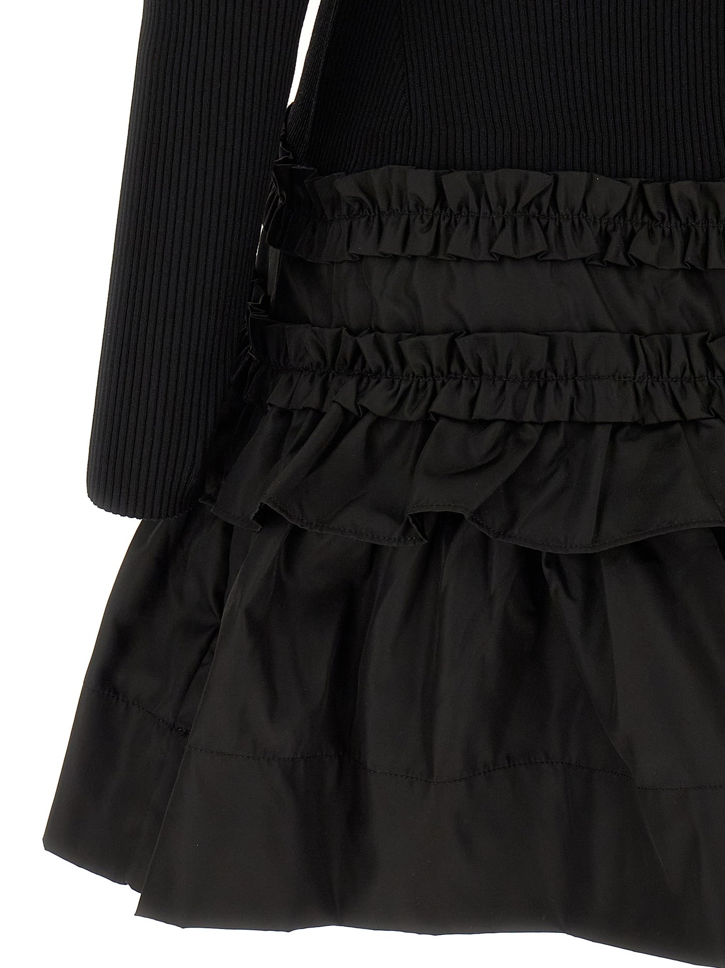 Dress by Ganni for women in stretch nylon viscose black presents a sinuous silhouette, showcasing a sophisticated and detailed with a sinuous short mini for a refined finish.