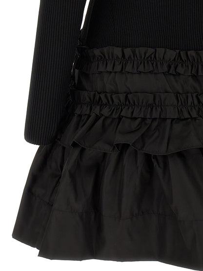 Dress by Ganni for women in stretch nylon viscose black presents a sinuous silhouette, showcasing a sophisticated and detailed with a sinuous short mini for a refined finish.