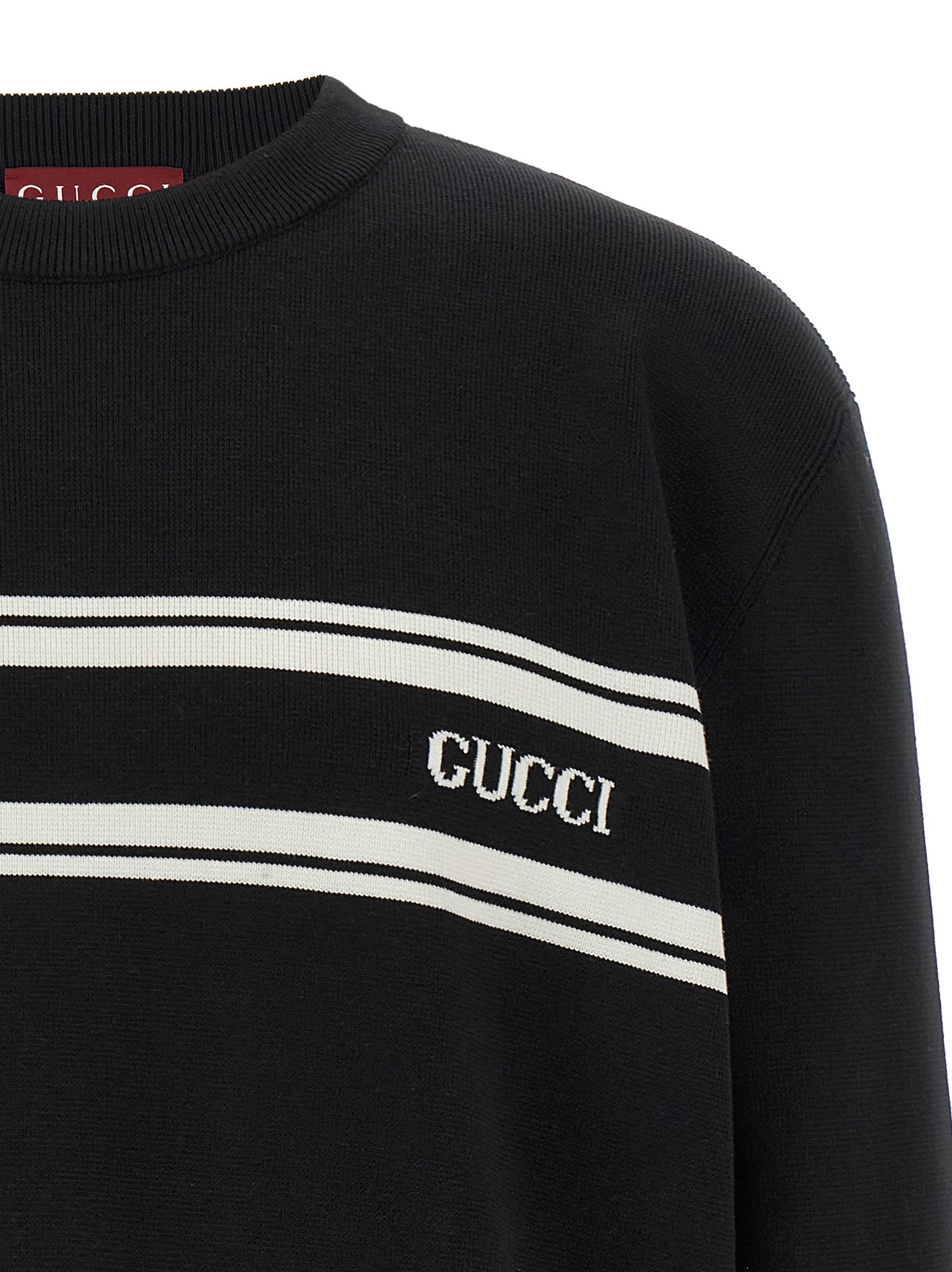 Cardigan by Gucci for men in wool bicolour, black & white features an crisp silhouette, showcasing a sophisticated round neckline and detail for a truly crisp finish.