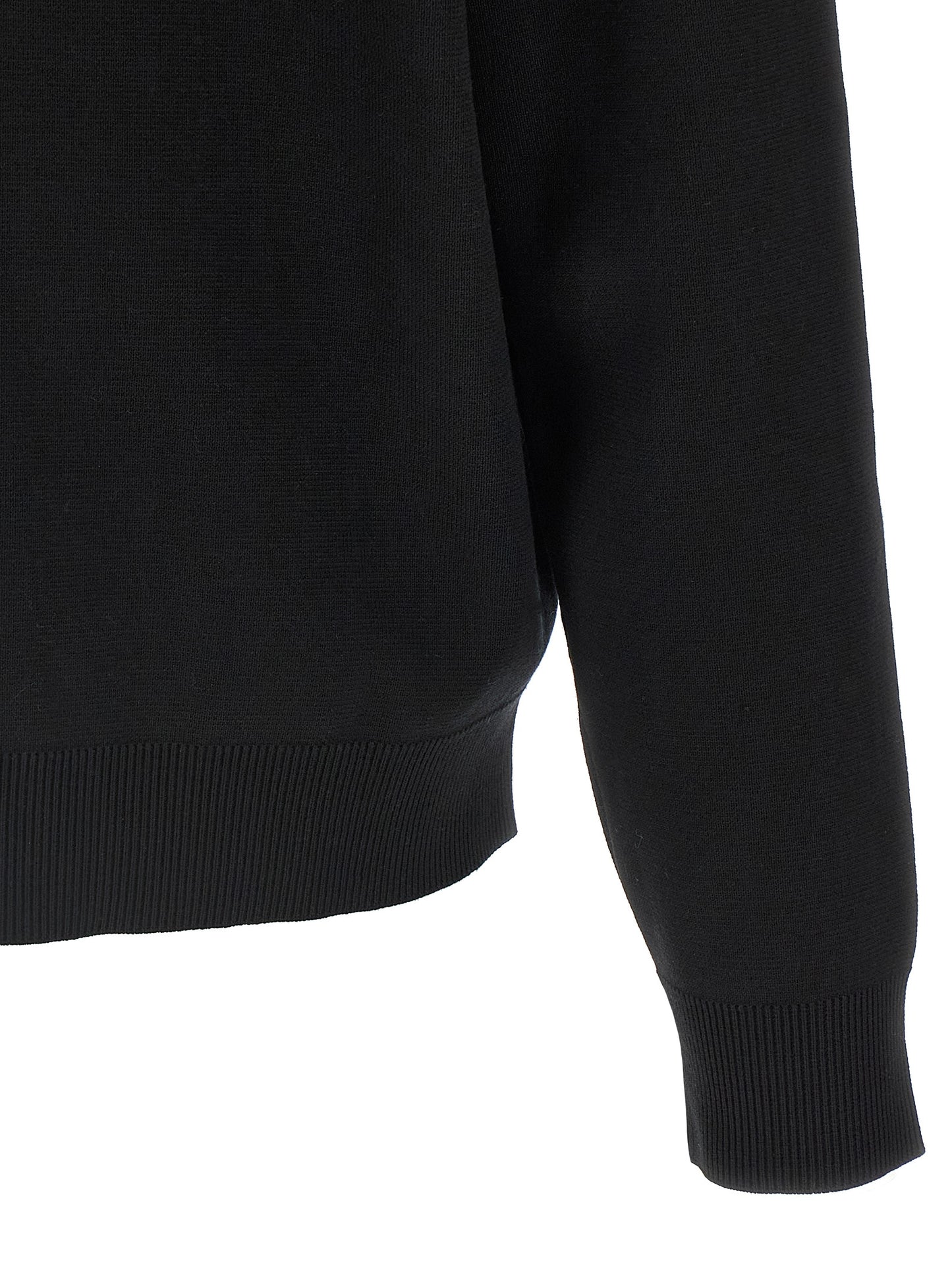 Cardigan by Gucci for men in wool bicolour, black & white features a dramatic silhouette, showcasing a sophisticated and dramatic detail for a timeless, premium look.