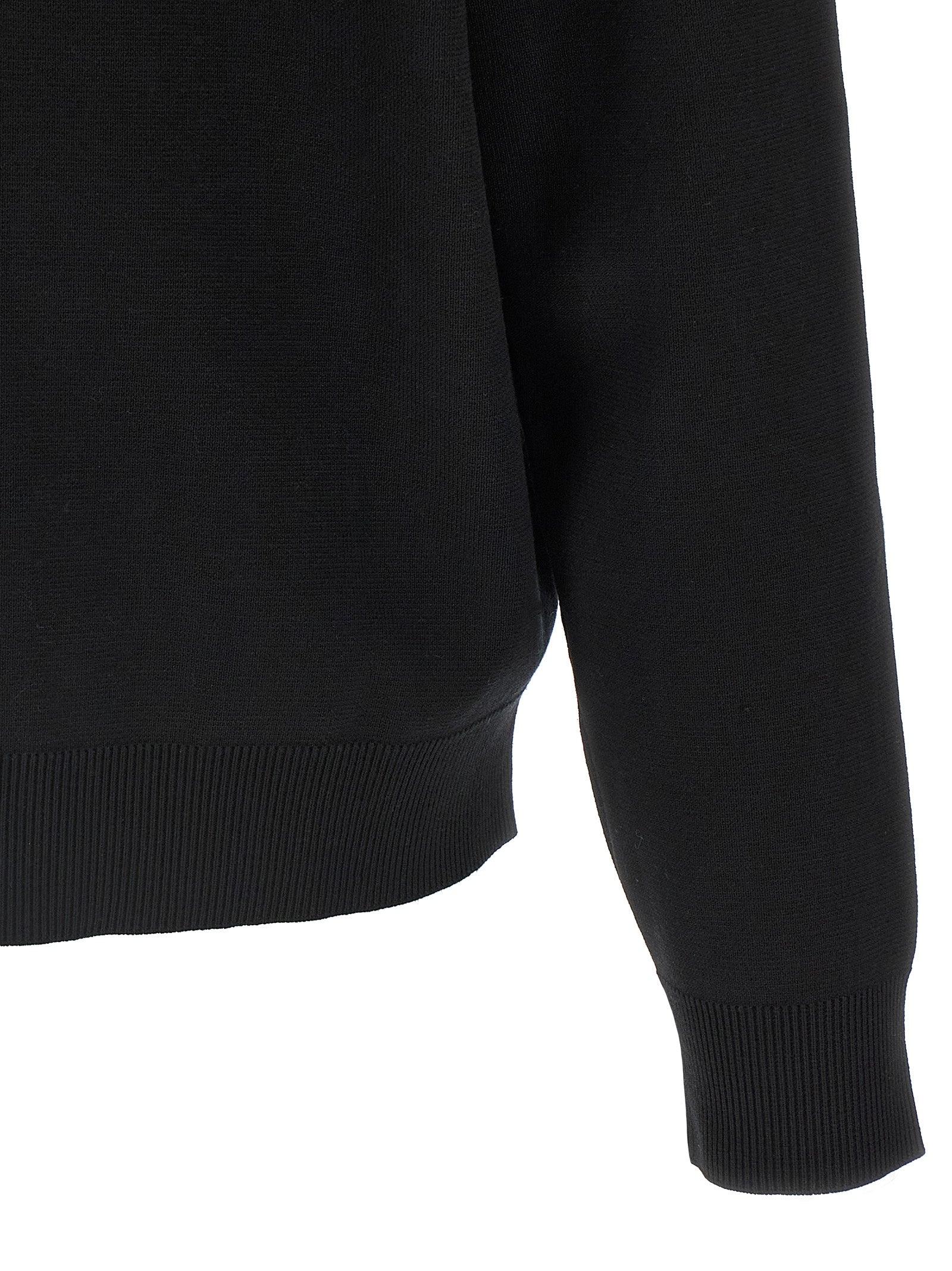 Cardigan by Gucci for men in wool bicolour, black & white features a dramatic silhouette, showcasing a sophisticated and dramatic detail for a timeless, premium look.