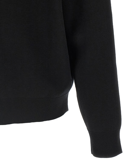Cardigan by Gucci for men in wool bicolour, black & white features a dramatic silhouette, showcasing a sophisticated and dramatic detail for a timeless, premium look.