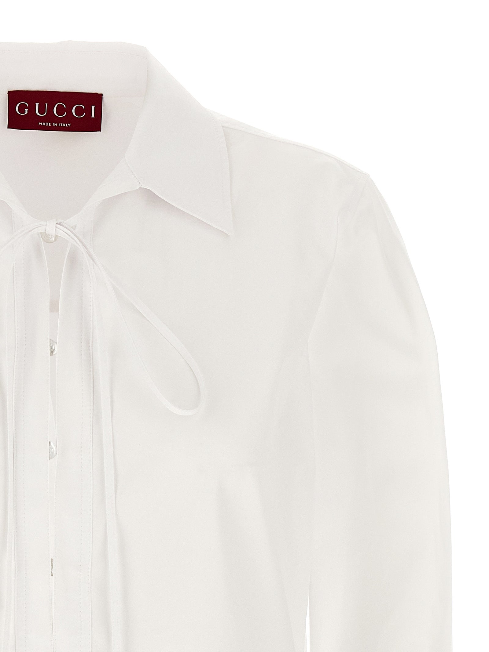 Dress by Gucci for women in cotton white features an eye catching silhouette with a sophisticated , elegant , and a refined short mini for a eye catching aesthetic.