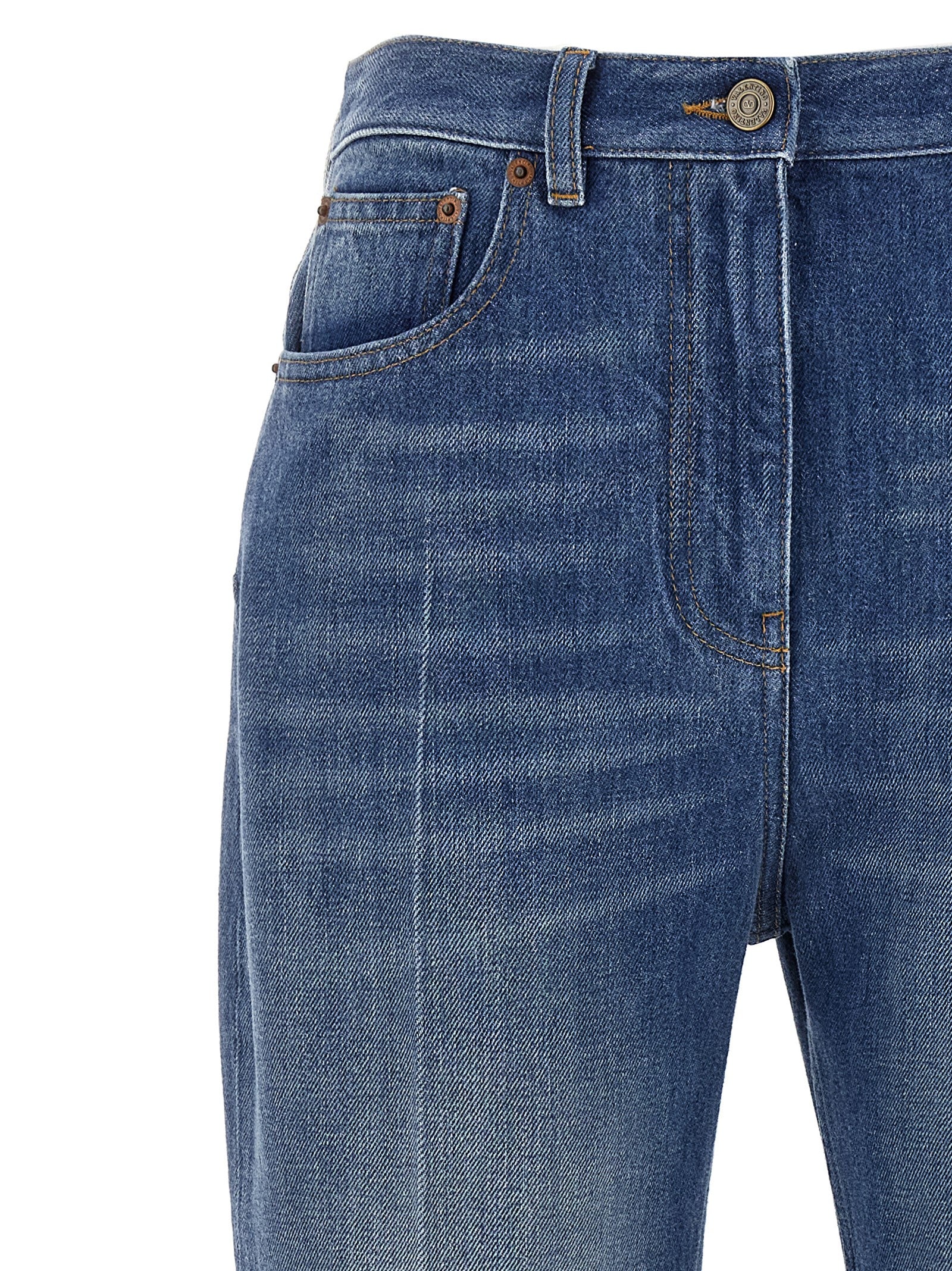 Jeans by Valentino Garavani for women in denim cotton light-blue presents a tailored silhouette, showcasing a tailored flared and long cut with a refined for a truly tailored aesthetic.