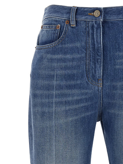 Jeans by Valentino Garavani for women in denim cotton light-blue presents a tailored silhouette, showcasing a tailored flared and long cut with a refined for a truly tailored aesthetic.