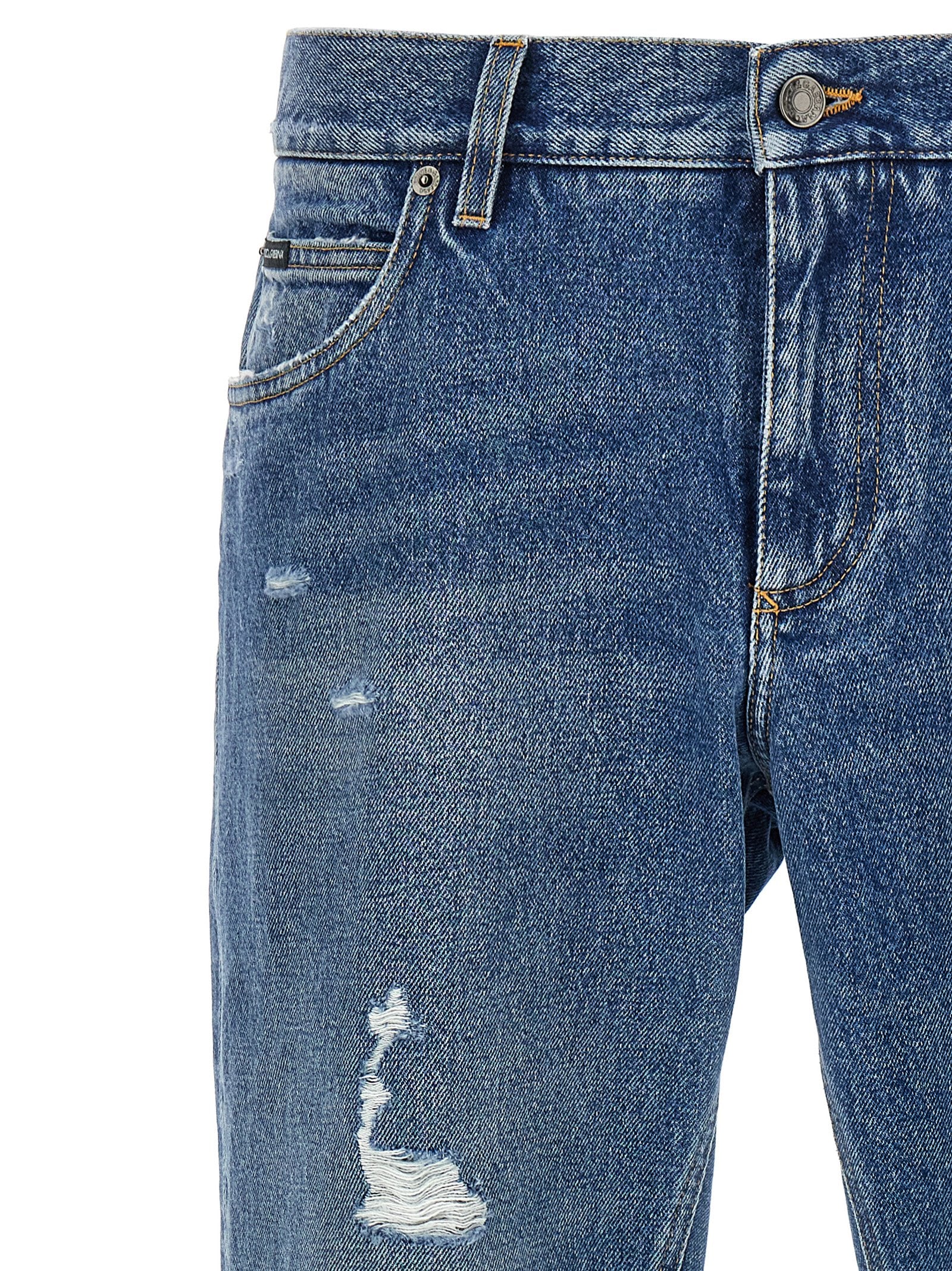 Jeans by Dolce & Gabbana for men in denim cotton blue & signature presents a refined pantology silhouette, artfully defined by a refined pantology straight-leg, long, and a sophisticated .