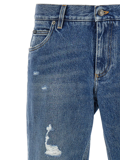 Jeans by Dolce & Gabbana for men in denim cotton blue & signature presents a refined pantology silhouette, artfully defined by a refined pantology straight-leg, long, and a sophisticated .