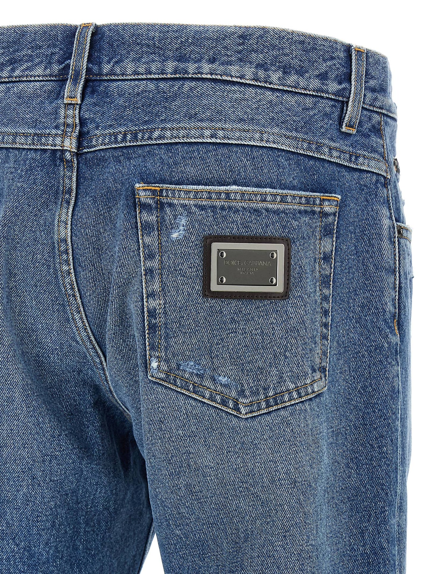 Jeans by Dolce & Gabbana for men in denim cotton blue & signature features an refined tailoring silhouette, showcasing a premium straight-leg with a and long cut for a refined tailoring look.