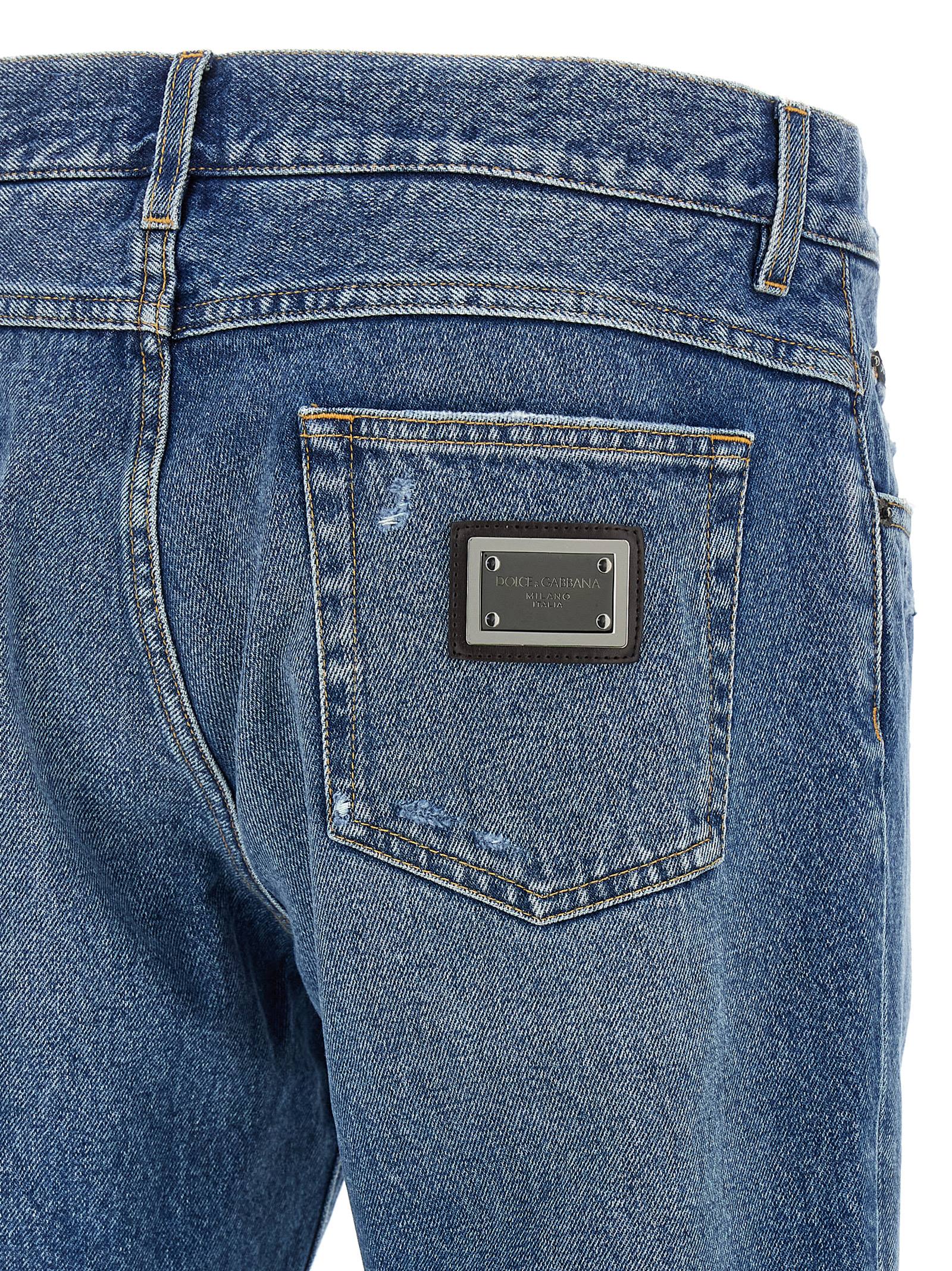 Jeans by Dolce & Gabbana for men in denim cotton blue & signature features an refined tailoring silhouette, showcasing a premium straight-leg with a and long cut for a refined tailoring look.