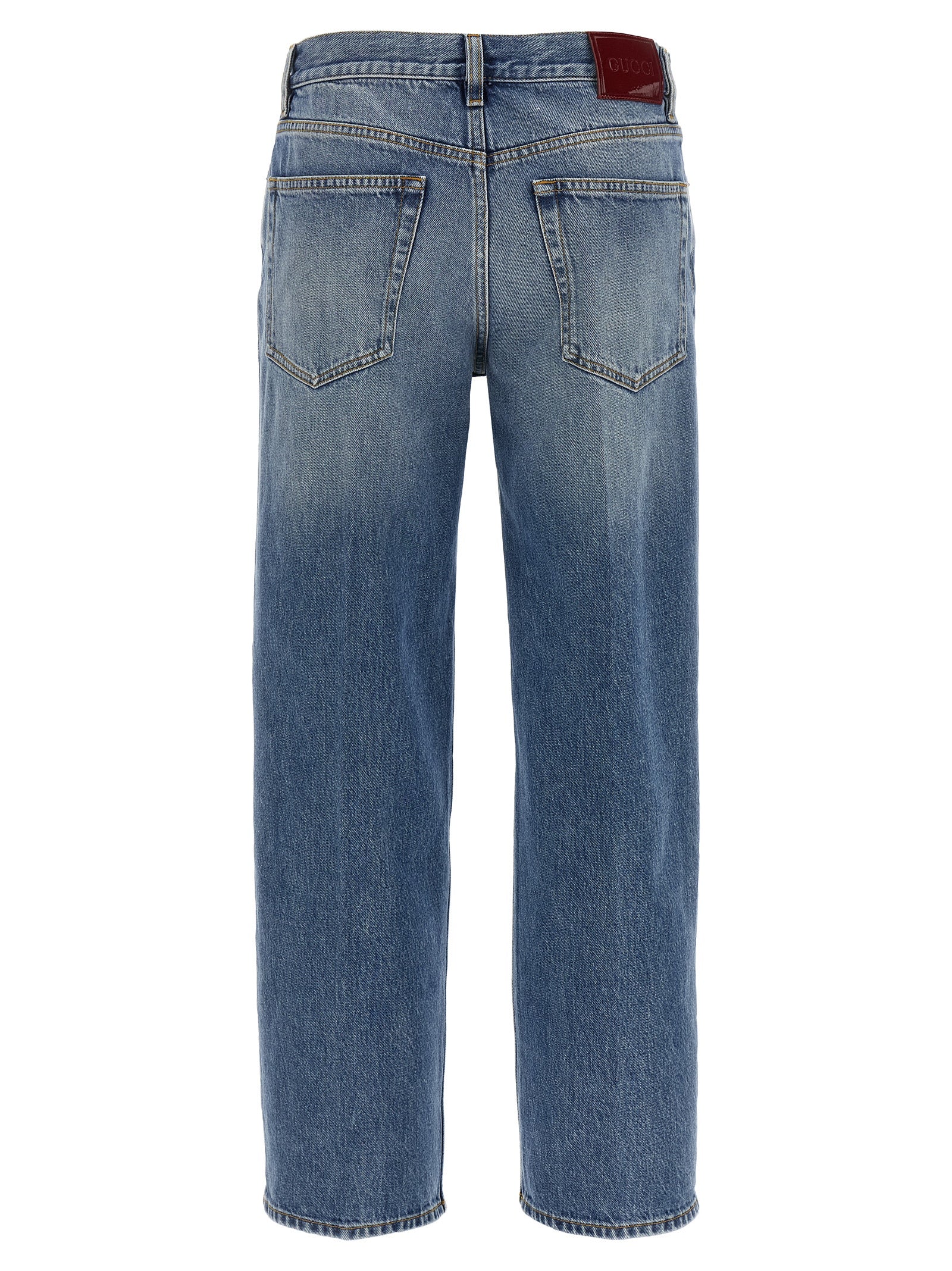 Jeans by Gucci for women in denim cotton light-blue, red & signature presents a refined pantology silhouette, artfully defined by a refined pantology straight-leg, long, and a sophisticated .