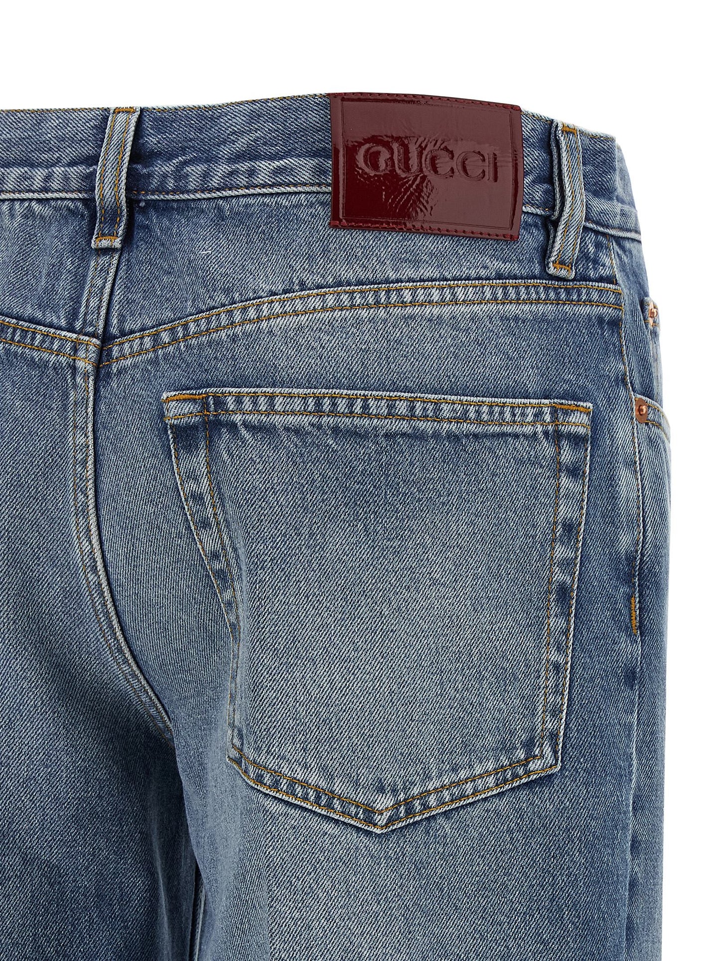Jeans by Gucci for women in denim cotton light-blue, red & signature presents a tailored silhouette, showcasing a tailored straight-leg and long cut with a refined for a truly tailored aesthetic.