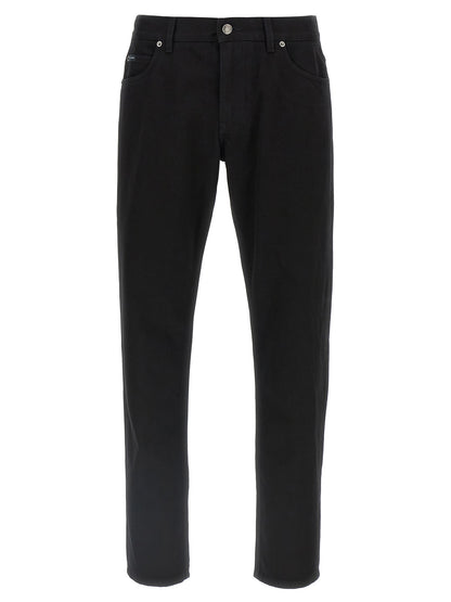 Jeans by Dolce & Gabbana for men in denim cotton black features a polished silhouette with a polished straight-leg, reaching a polished long and finished with a polished .