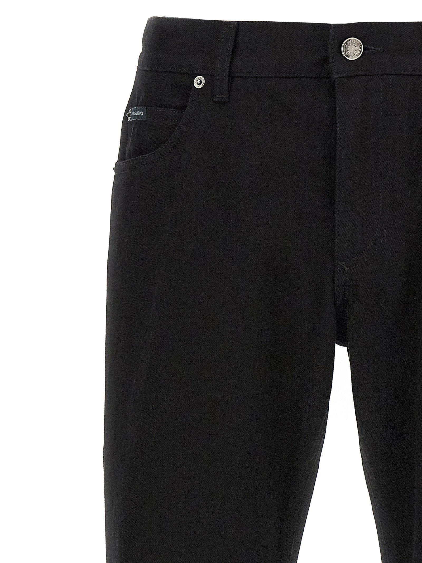 Jeans by Dolce & Gabbana for men in denim cotton black features an sartorial straight-leg and long with a cut for a sartorial finish.