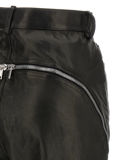 Pants by Rick Owens for women in leather black features a enduring silhouette, showcasing a enduring and long with a high rise for a premium, tailored aesthetic.