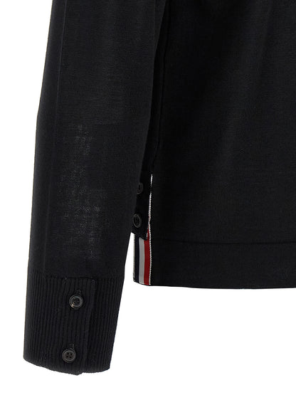 Cardigan by Thom Browne for men in virgin wool black & signature presents a textural silhouette, artfully finished with a textural and for a sophisticated, textural look.