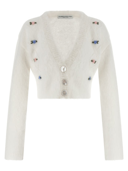Cardigan by Alessandra Rich for women in mohair polyamide & alpaca wool white showcases a luxurious silhouette, meticulously detailed with a sophisticated v-neck neckline and long-sleeve for a refined finish.