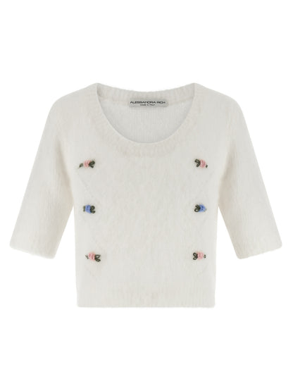 Cardigan by Alessandra Rich for women in mohair polyamide & alpaca wool white showcases a luxurious silhouette, meticulously detailed with a sophisticated round neckline and short-sleeve for a refined finish.