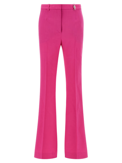 Trousers by Versace for women in virgin wool fuchsia features a tailored silhouette with a tailored straight-leg & flared, defined by its long and a sophisticated .