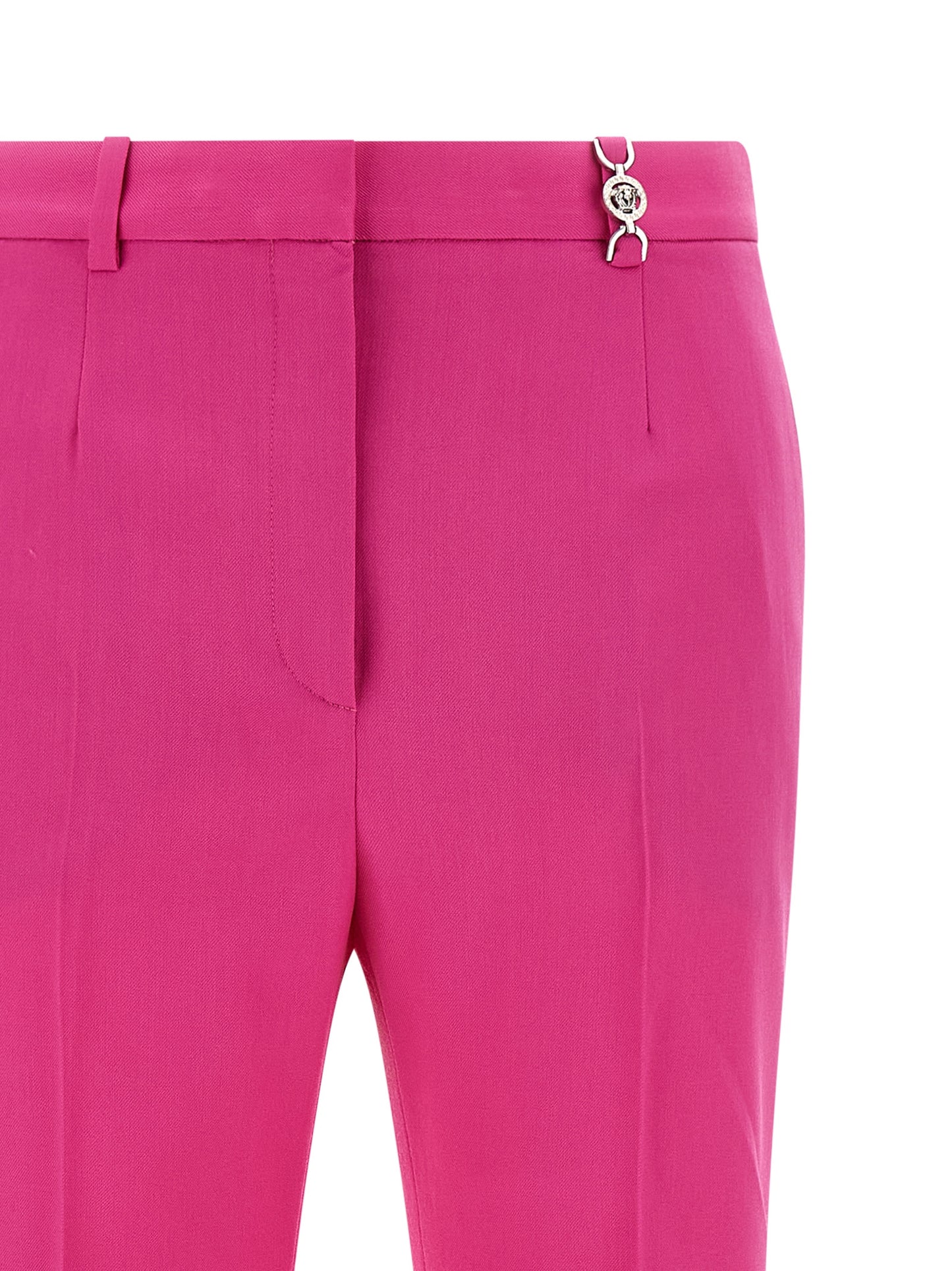 Trousers by Versace for women in virgin wool fuchsia presents a perennial silhouette, meticulously tailored with a straight-leg & flared cut, long finish, and an elegant .