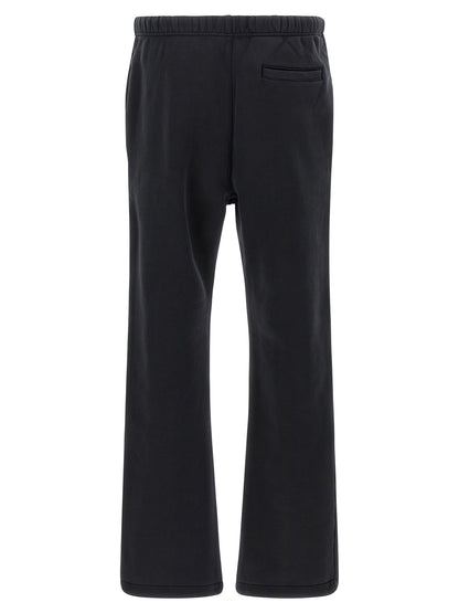 Joggers by PURPLE for men in cotton black & purple presents a tailored silhouette, showcasing a tailored straight-leg & wide and long cut with a refined for a truly tailored aesthetic.
