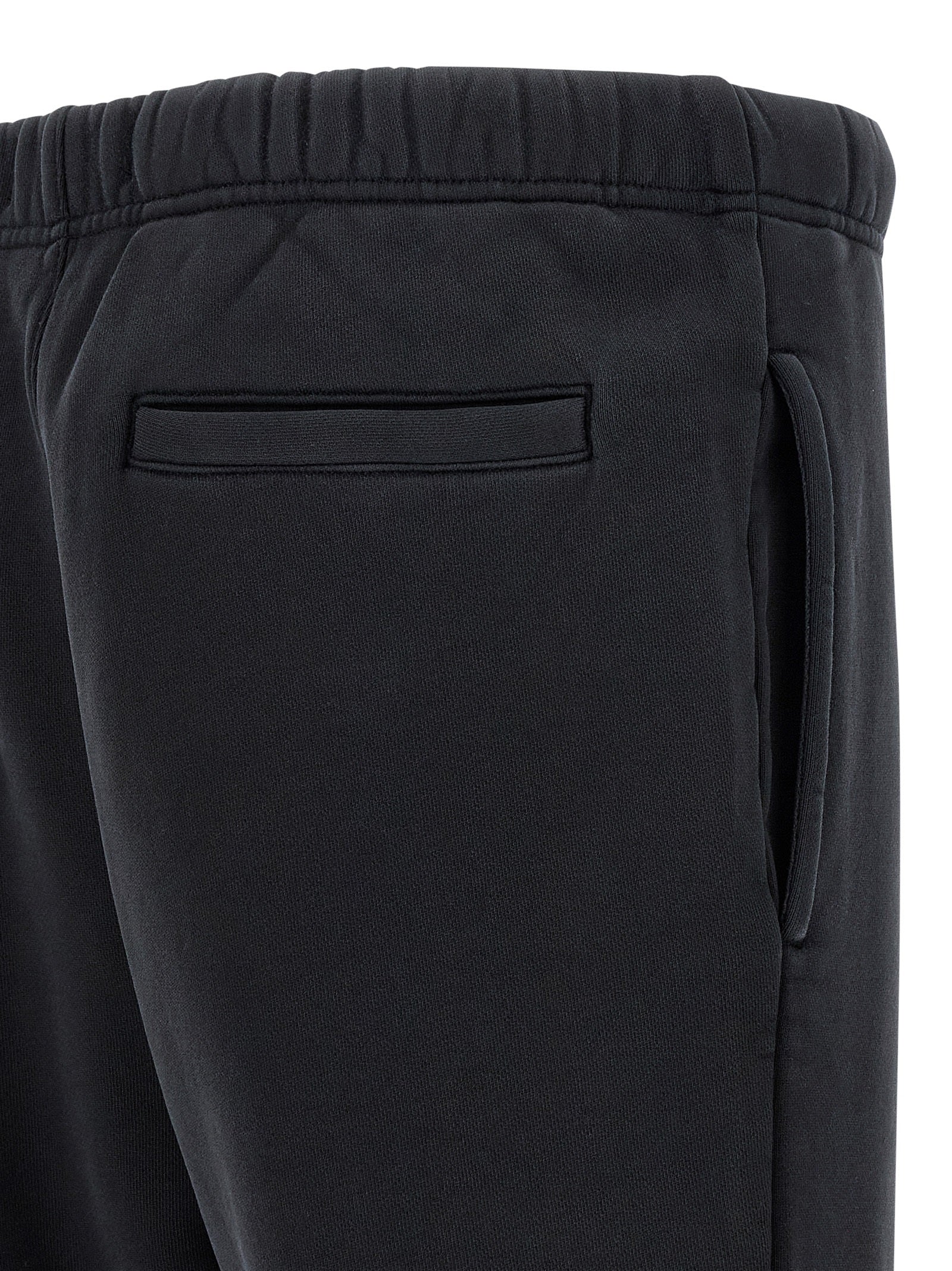 Joggers by PURPLE for men in cotton black & purple features a refined silhouette with a refined straight-leg & wide, defined by a and a refined long for a refined finish.
