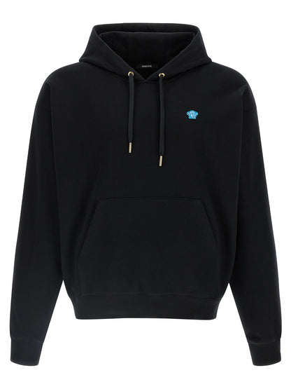 Sweatshirt Hoodie by Versace for men in cotton black features an avant-garde silhouette, showcasing a sophisticated hooded neckline and detail for a truly avant-garde finish.