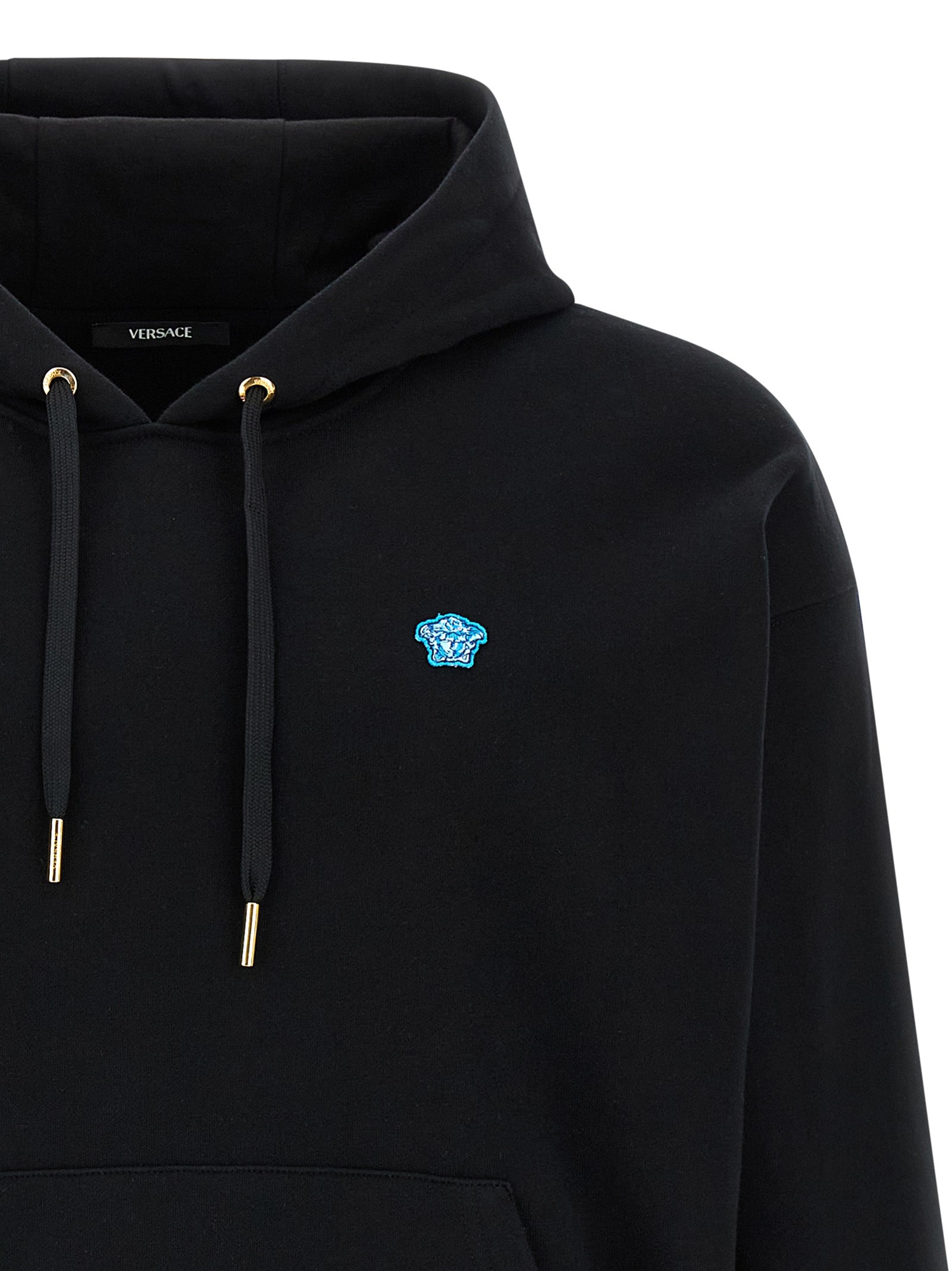 Sweatshirt Hoodie by Versace for men in cotton black features an luminous silhouette, showcasing a sophisticated hooded neckline and for a truly luminous look.