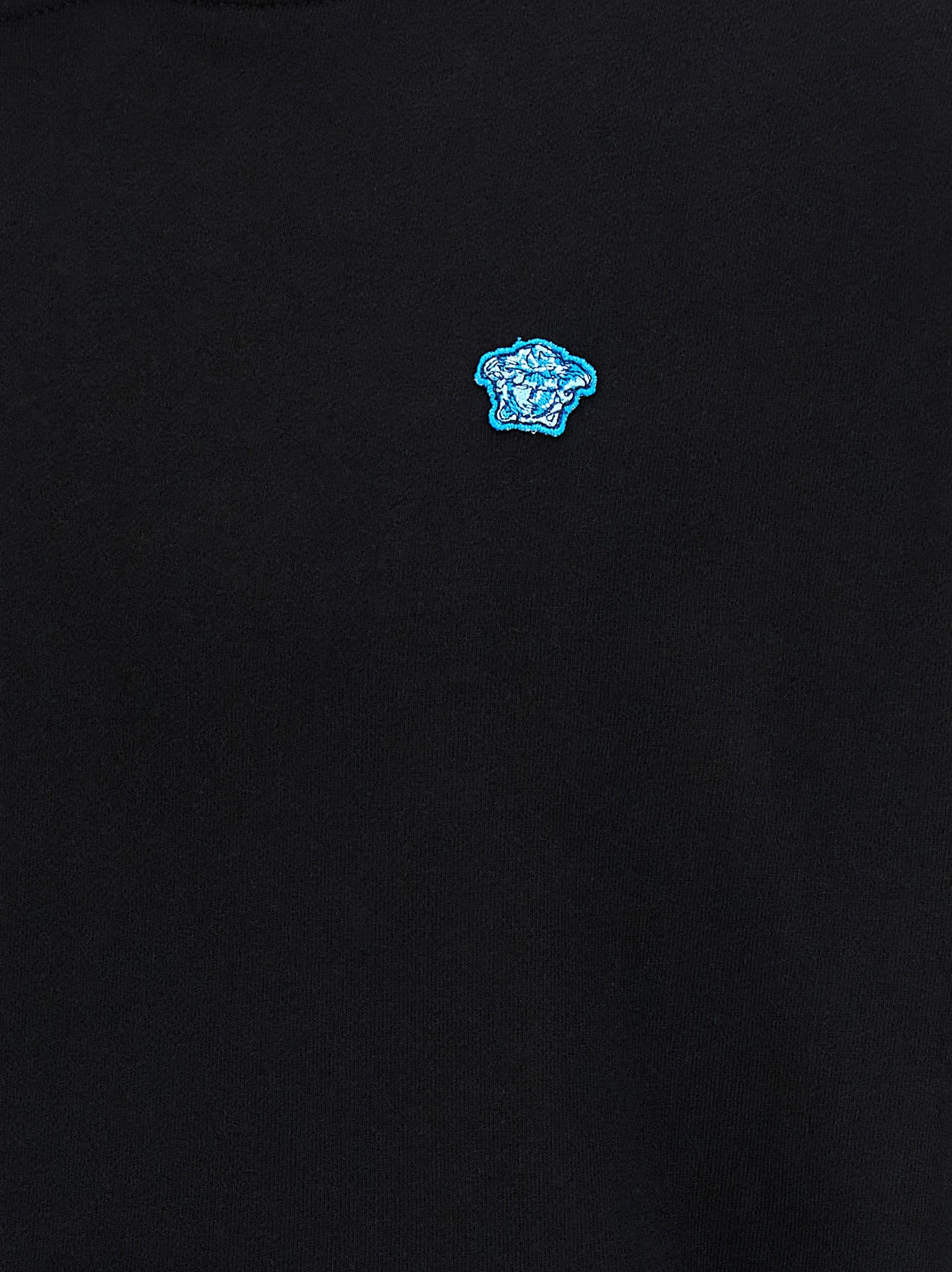 Sweatshirt Hoodie by Versace for men in cotton black features a edgy silhouette, detailed with a edgy and for a refined finish.