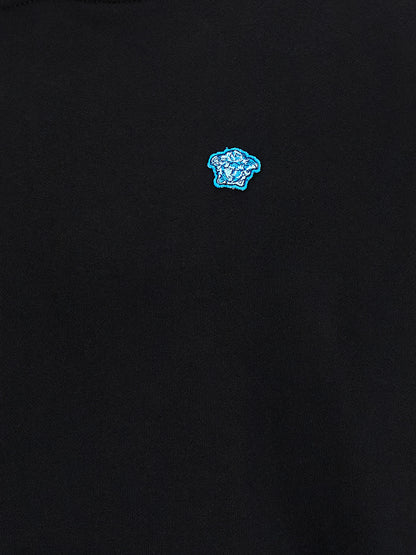 Sweatshirt Hoodie by Versace for men in cotton black features a edgy silhouette, detailed with a edgy and for a refined finish.