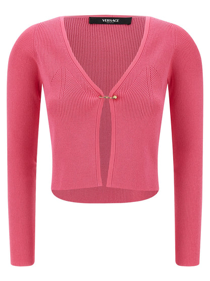 Cardigan by Versace for women in polyester & viscose fuchsia features an crisp silhouette, showcasing a sophisticated v-neck neckline and long-sleeve detail for a truly crisp finish.