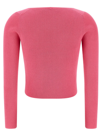 Cardigan by Versace for women in polyester & viscose fuchsia features a dramatic silhouette, showcasing a sophisticated v-neck neckline and dramatic detail for a timeless, premium look.