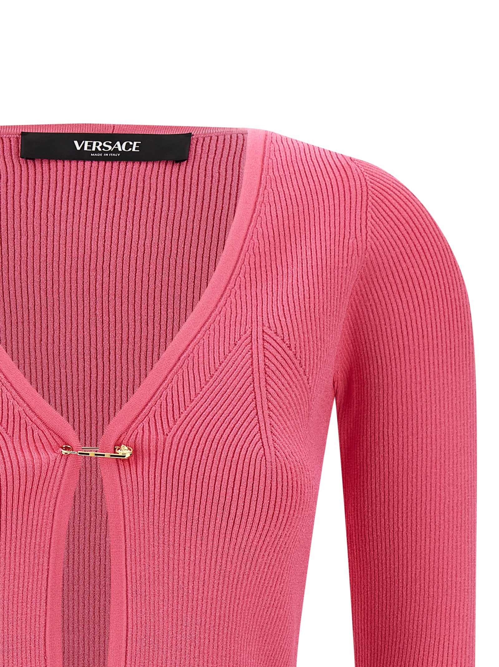 Cardigan by Versace for women in polyester & viscose fuchsia features an impeccable silhouette, showcasing a sophisticated v-neck neckline and detail for a truly impeccable finish.