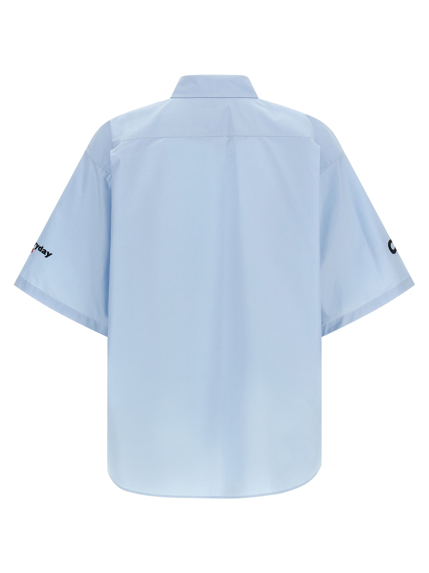 Shirt by Balenciaga for men in cotton light-blue presents a discerning silhouette, showcasing a sophisticated and for a truly discerning finish.