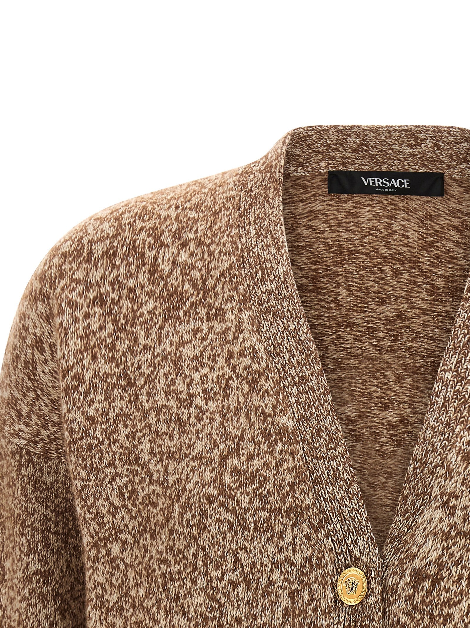 Cardigan by Versace for women in silk virgin cashmere wool beige features a dramatic silhouette, showcasing a sophisticated v-neck neckline and dramatic detail for a timeless, premium look.