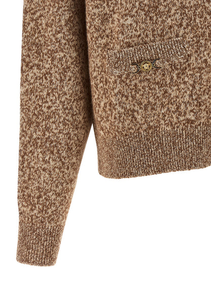 Cardigan by Versace for women in silk virgin cashmere wool beige features an impeccable silhouette, showcasing a sophisticated and detail for a truly impeccable finish.
