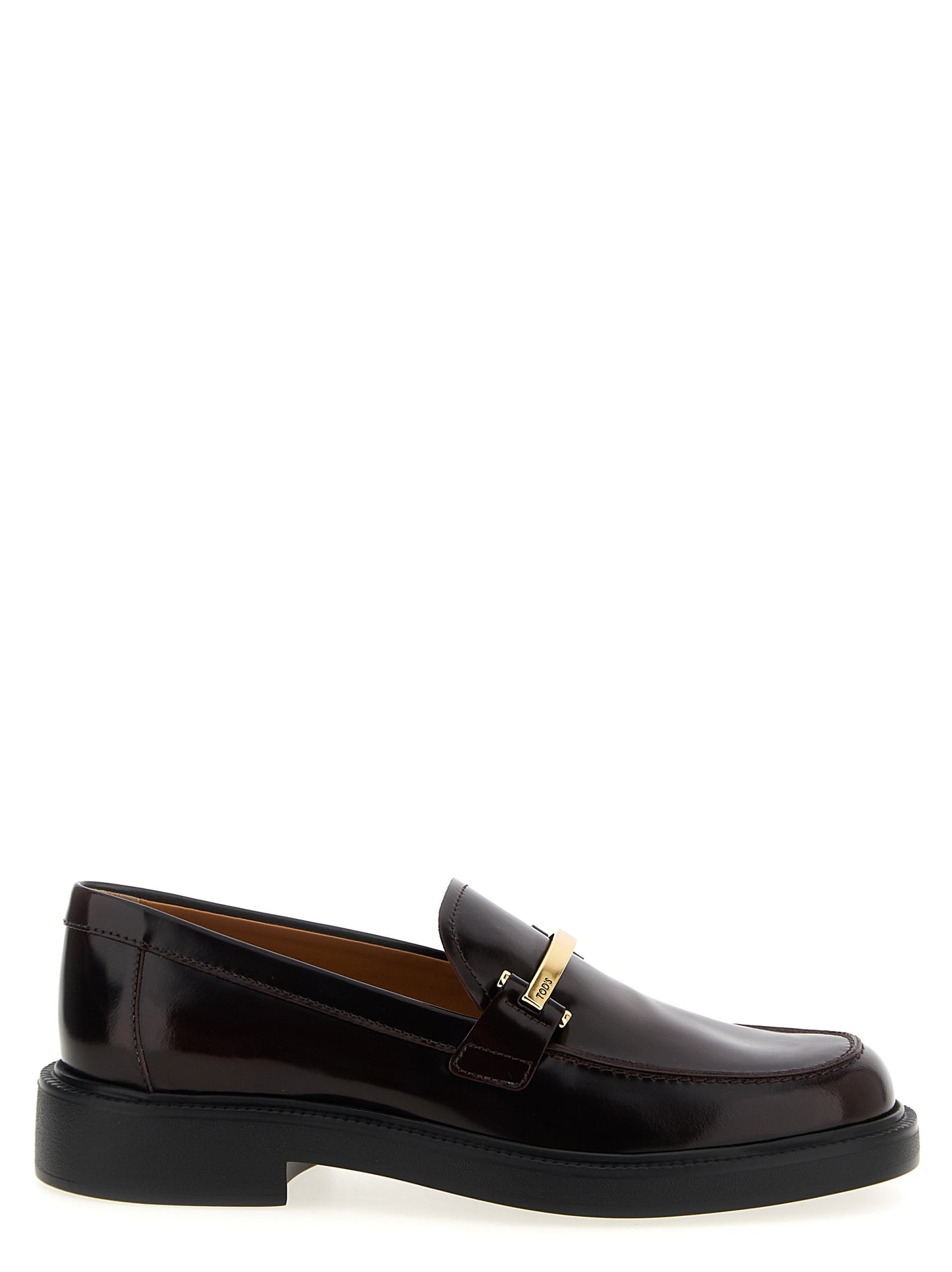 Flat Loafer Slip-On Shoes by Tod's for women in calfskin leather bordeaux showcases a timeless silhouette from the City Women's Calfskin Leather Flat Loafer Slip-On Shoes collection, featuring a timeless flat and for a timeless finish.