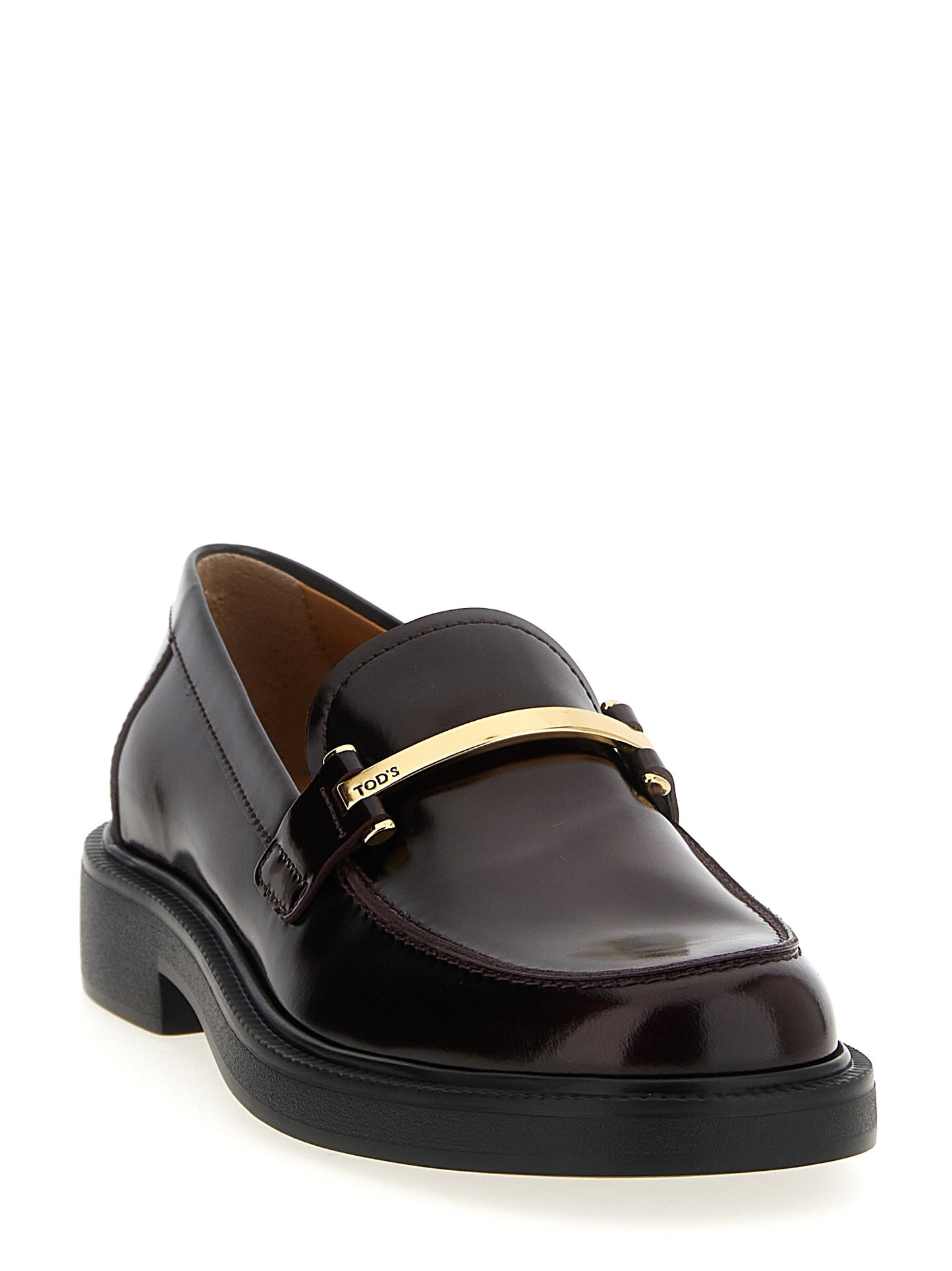 Flat Loafer Slip-On Shoes by Tod's for women in calfskin leather bordeaux features an effortless chic silhouette, showcasing the City Women's Calfskin Leather Flat Loafer Slip-On Shoes design with an effortless chic flat and a for a effortless chic look.