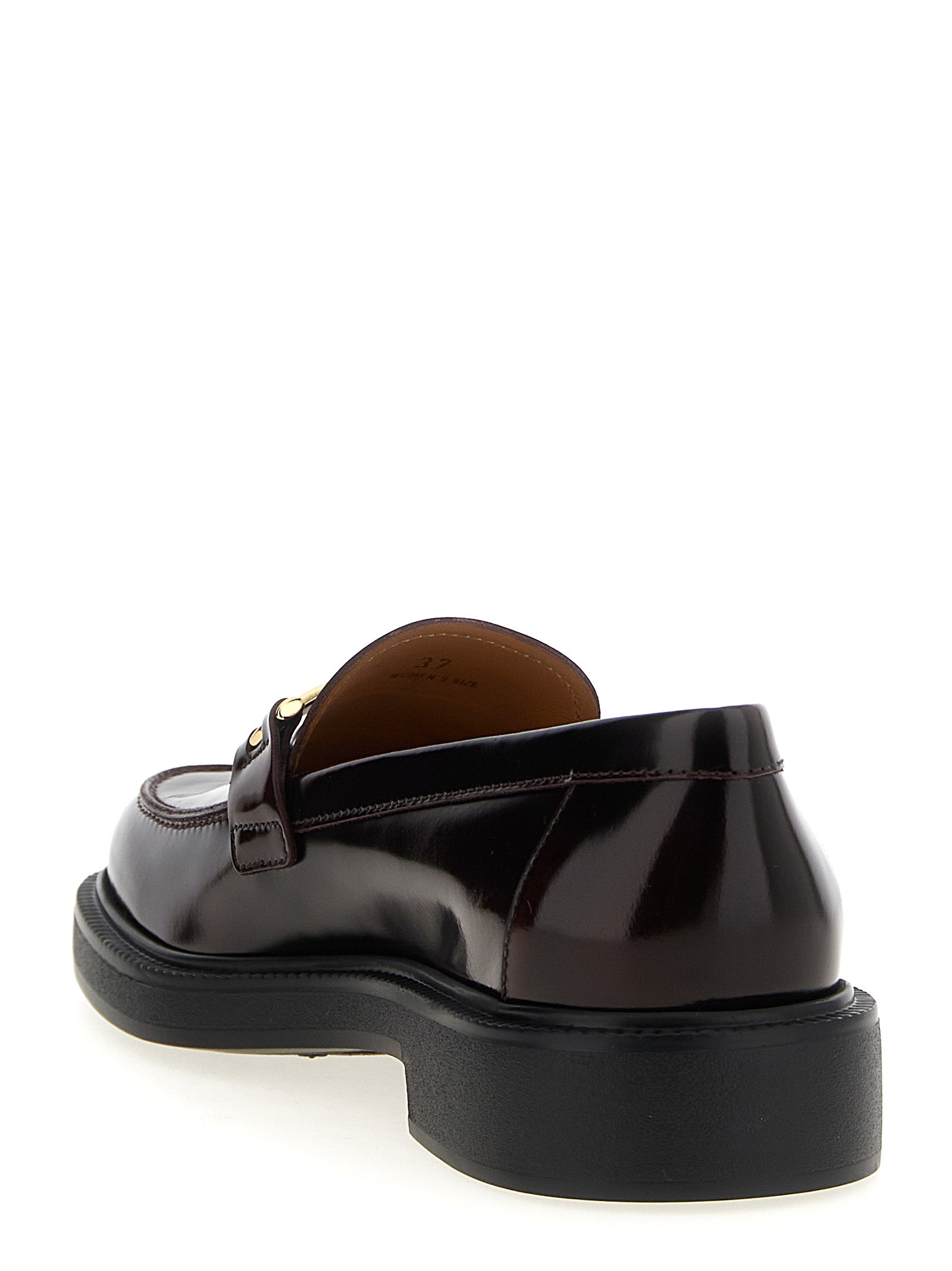 This Flat Loafer Slip-On Shoes by Tod's for women in calfskin leather bordeaux features an exquisite silhouette from the City Women's Calfskin Leather Flat Loafer Slip-On Shoes collection, defined by a sophisticated flat and elegant .