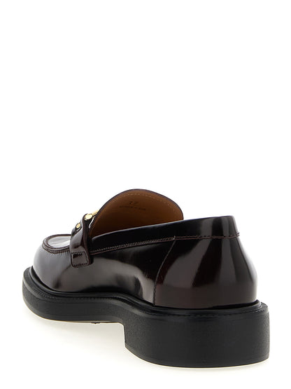 This Flat Loafer Slip-On Shoes by Tod's for women in calfskin leather bordeaux features an exquisite silhouette from the City Women's Calfskin Leather Flat Loafer Slip-On Shoes collection, defined by a sophisticated flat and elegant .