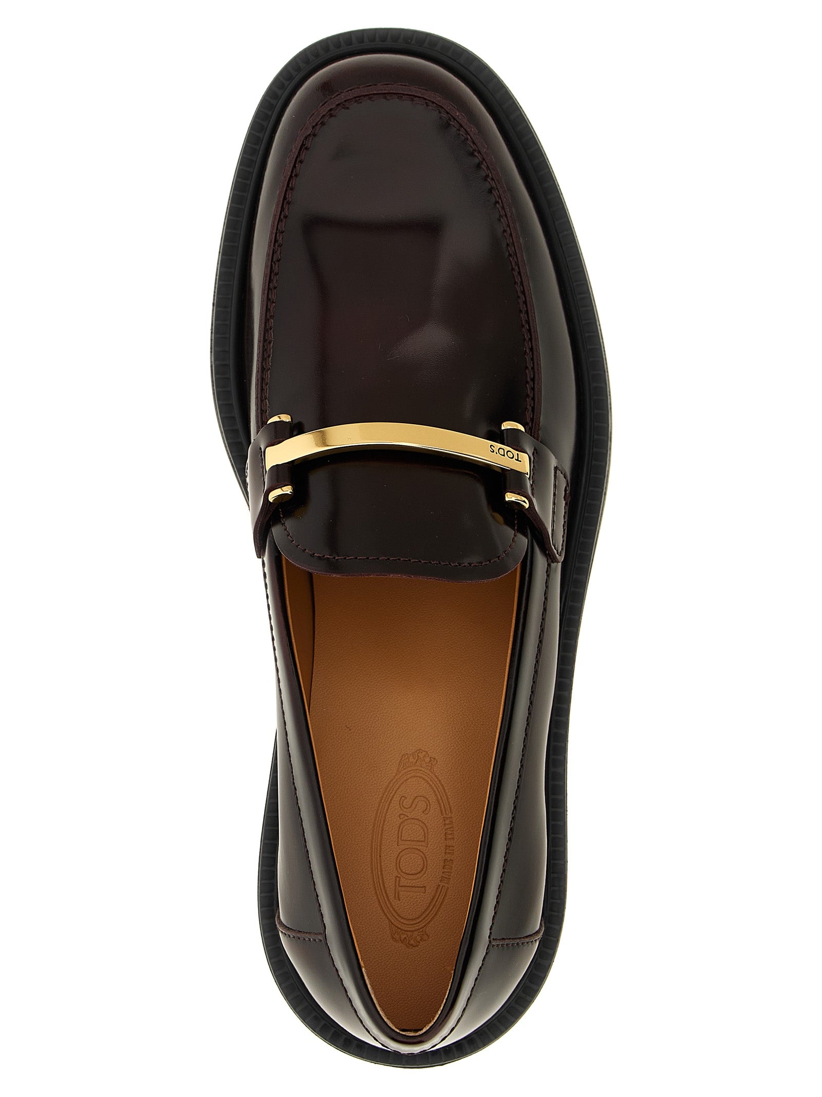 Flat Loafer Slip-On Shoes by Tod's for women in calfskin leather bordeaux showcases a resplendent City Women's Calfskin Leather Flat Loafer Slip-On Shoes aesthetic, defined by its resplendent and elegant flat.