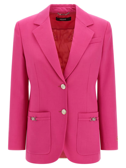 This Blazer by Versace for women in virgin wool silk twill fuchsia presents a tailored silhouette, meticulously tailored with a tailored and distinctive for a tailored finish.