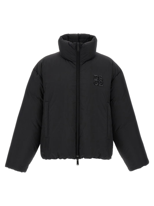 This Puffer Jacket by Dsquared² for men in nylon & polyester black exhibits a edgy silhouette, meticulously detailed with functional insulated and a edgy high-neck neckline for a edgy finish.