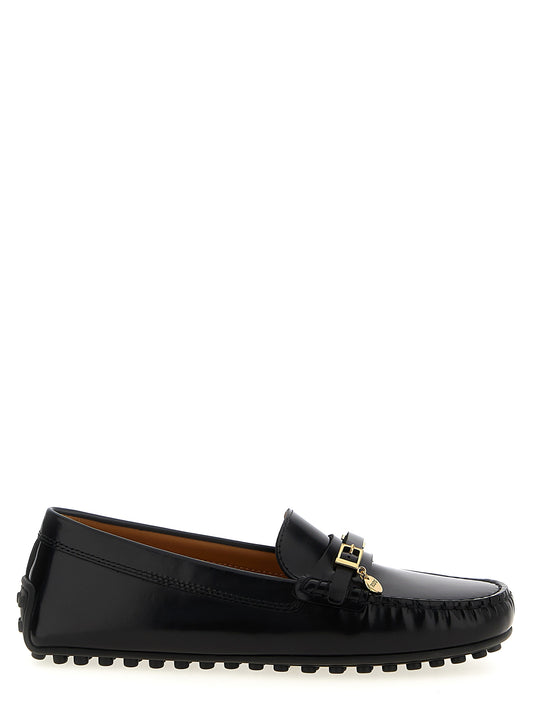 Flat Loafer Slip-On Strap Shoes by Tod's for women in calfskin leather black features an effortless chic silhouette, showcasing the City Women's Calfskin Leather Flat Loafer Slip-On Strap Shoes design with an effortless chic flat and a for a effortless chic look.