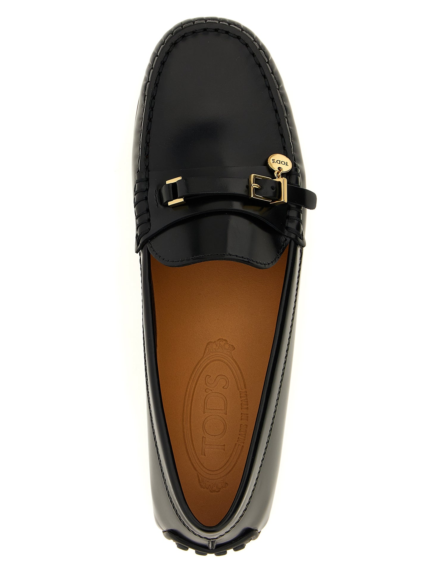 Flat Loafer Slip-On Strap Shoes by Tod's for women in calfskin leather black showcases a timeless silhouette from the City Women's Calfskin Leather Flat Loafer Slip-On Strap Shoes collection, featuring a timeless flat and for a timeless finish.