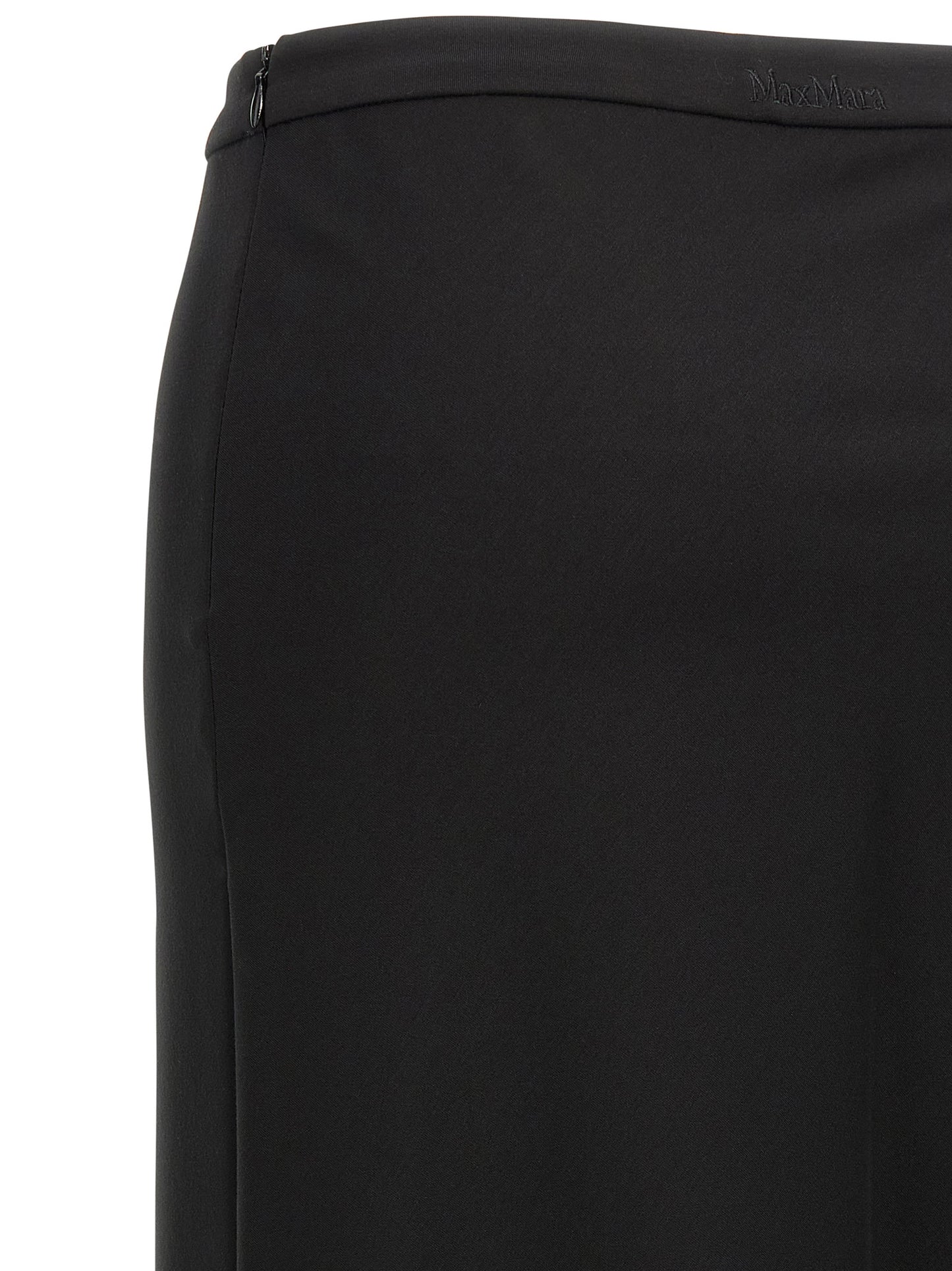 Skirt by Max Mara for women in stretch polyamide cotton black showcases a sultry silhouette, elegantly defined by its mini and the sophisticated sultry design of the Women's Flared Stretch Polyamide Cotton Mini Skirt.