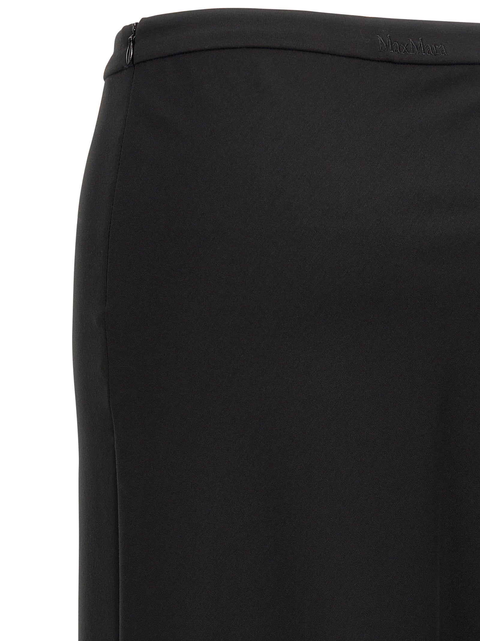 Skirt by Max Mara for women in stretch polyamide cotton black showcases a sultry silhouette, elegantly defined by its mini and the sophisticated sultry design of the Women's Flared Stretch Polyamide Cotton Mini Skirt.