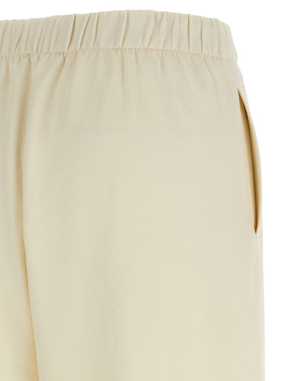 Casual Pants by Max Mara for women in silk & cotton white presents a tailored silhouette, showcasing a tailored straight-leg and long cut with a refined for a truly tailored aesthetic.