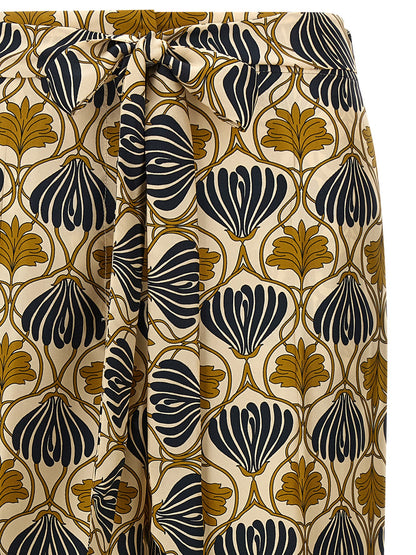 Trousers by Max Mara for women in silk bicolour, yellow & print features a artisanal silhouette, showcasing a sophisticated straight-leg & cropped with a cropped and for a artisanal finish.