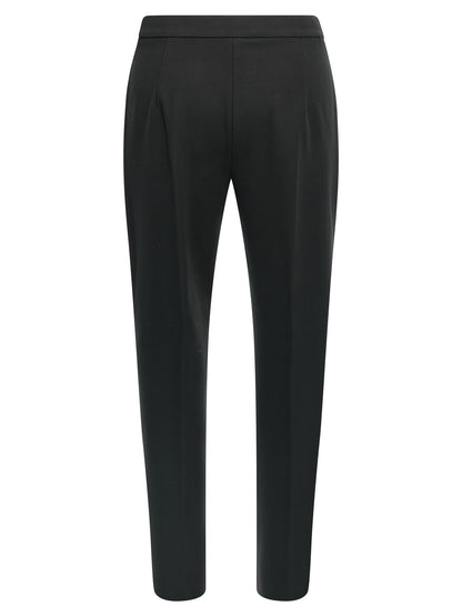 Casual Pants by Max Mara for women in stretch polyamide viscose black presents a tailored silhouette, showcasing a tailored straight-leg & cropped and cropped cut with a refined for a truly tailored aesthetic.