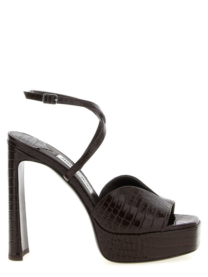 Platform Stiletto Ankle Strap Sandals by Jimmy Choo for women in polyester crocodile skin leather brown & print features an architectural design from the Women's Polyester Crocodile Skin Leather Platform Stiletto Ankle Strap Sandals collection, defined by a architectural stiletto platform and square toe style for a architectural finish.